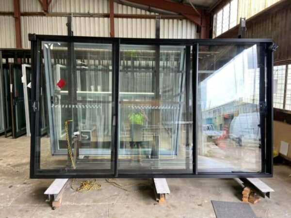 black aluminium stacker door